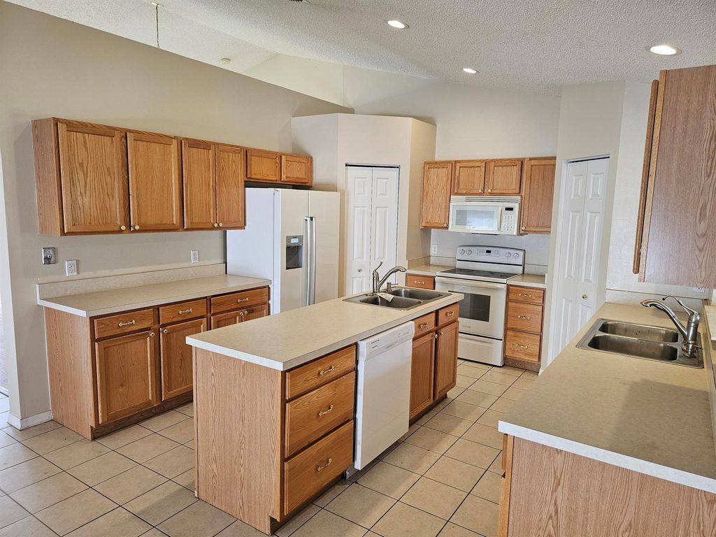 Photo of 2510 SW Chestnut Lane, Port Saint Lucie, FL 34953 (MLS # R11125137)