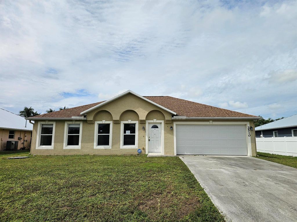 Photo of 2510 SW Chestnut Lane, Port Saint Lucie, FL 34953 (MLS # R11125137)