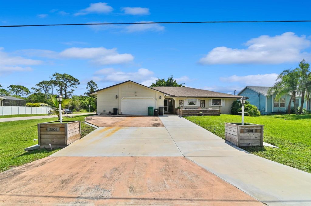 Photo of 2501 SW Cooper Lane, Port St Lucie, FL 34984 (MLS # R10897592)