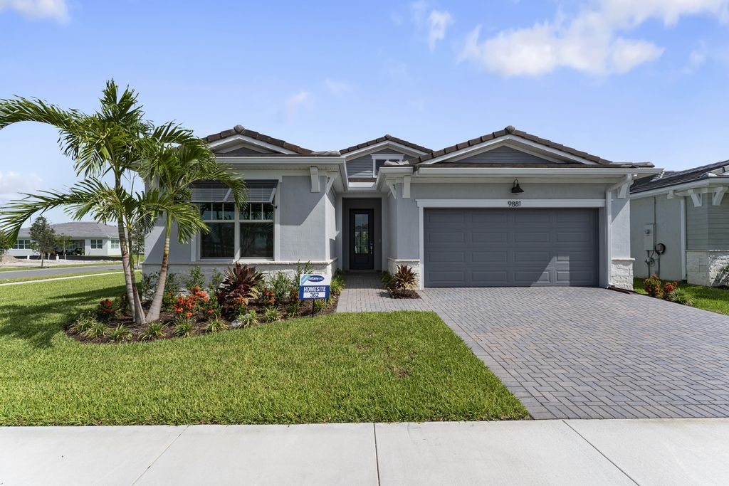 Photo of 9881 SW Isabelline Drive, Port Saint Lucie, FL 34987 (MLS # R10896069)