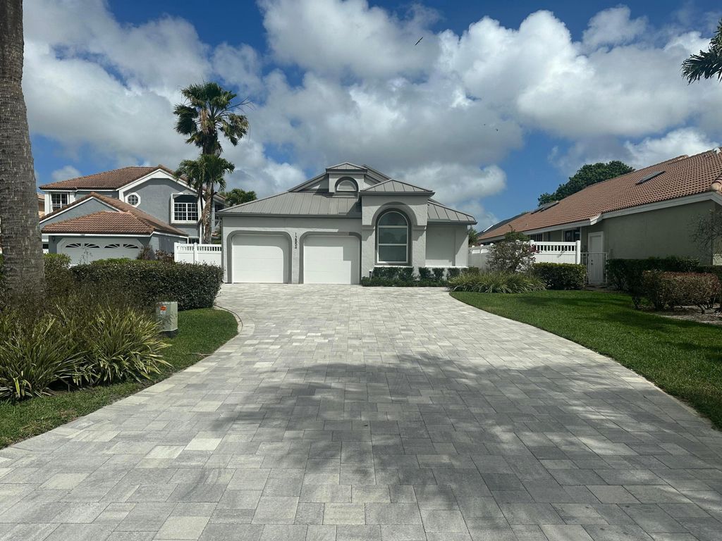 Photo of 12854 Touchstone Place, Palm Beach Gardens, FL 33418 (MLS # R11121218)