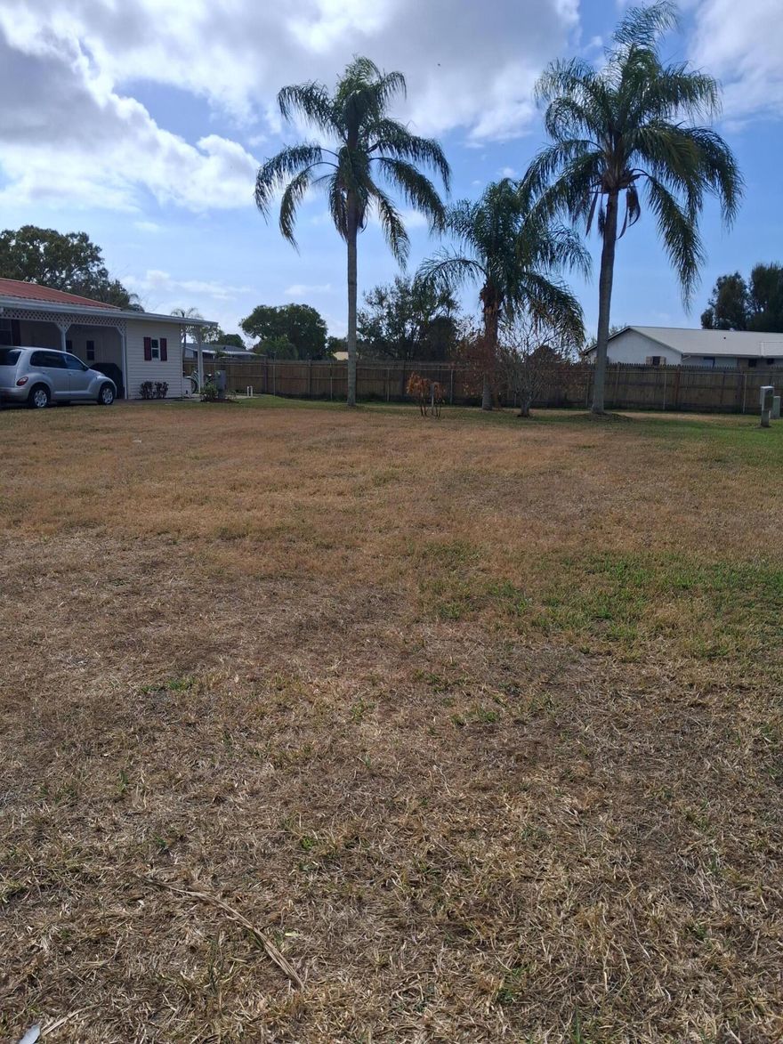 SEMINOLE COVE:  VACANT LOT  55+ Community.  Cleared lot with mature palm trees ready to add mobile home.  So much to do in this established community and close to shopping and Lake Okeechobee.  Park amenities include heated swimming pool, large clubhouse, shuffleboard court, fish cleaning house and many activities