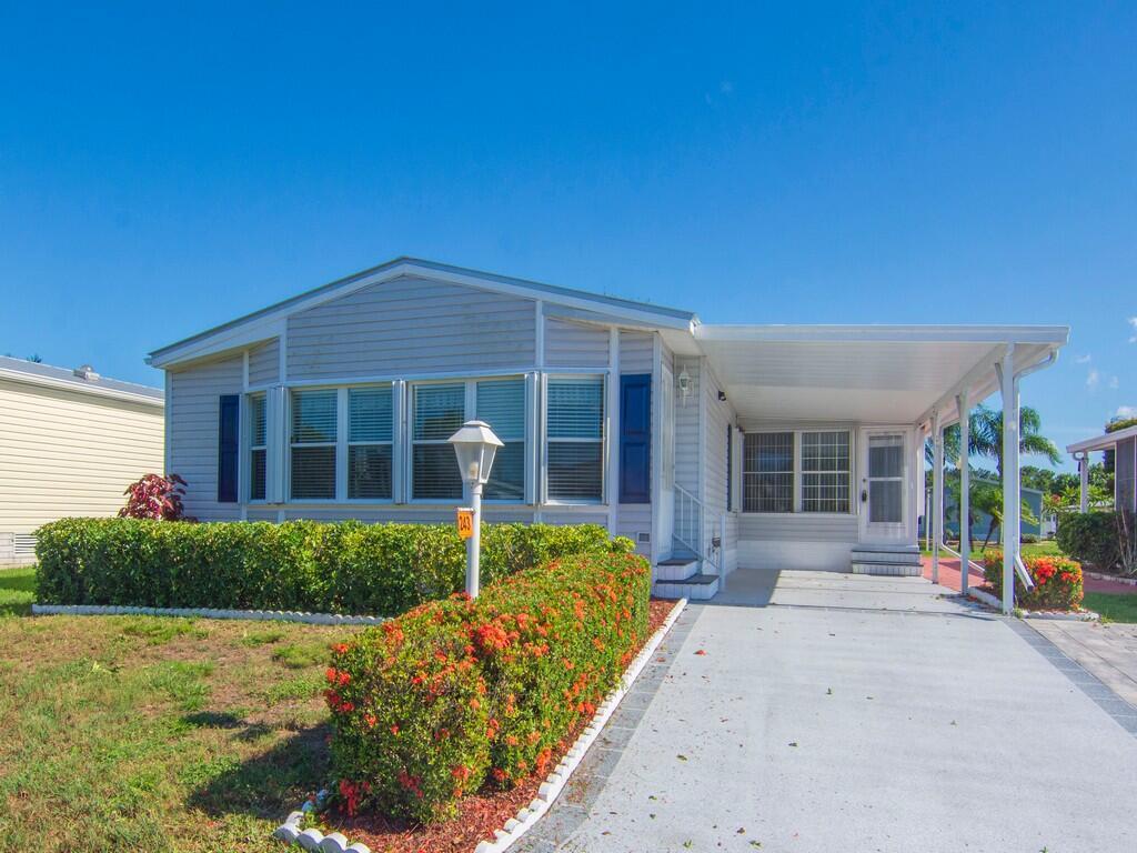 Welcome home to this bright and spacious manufactured home, built for comfort. This home is move-in ready! Complete with washer and dryer, storm shutters, not to mention the amazing amenities that this community has to offer. Schedule your showing today before it's too late!