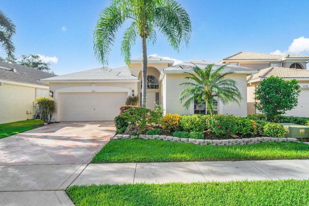 Photo of 7770 Edinburough Lane, Delray Beach, FL 33446 (MLS # R10921819)