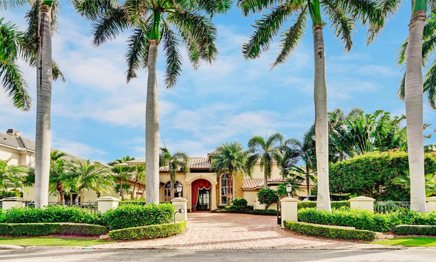 Intracoastal home available in Royal Palm Yacht & Country Club on 100 feet of waterfront. Home features 5 bedrooms + library, 5 and 1/2 bathrooms, and 5,674 sqft under air. Formal living room, formal dining room, volume ceilings, custom moldings throughout, marble flooring on 1st floor, and wood flooring on 2nd floor. Gourmet kitchen with granite countertops and custom cabinetry, large center work island with vegetable sink and steamer, gas stove, wall oven, ample counter space with bar seating, and large walk-in pantry. First floor master suite with sitting area, French doors out to loggia, separate his and her bathrooms, and his and her closets. Exterior features a heated infinity edge pool and spa overlooking the Intracoastal, summer kitchen, marble dock with power and water, and more!