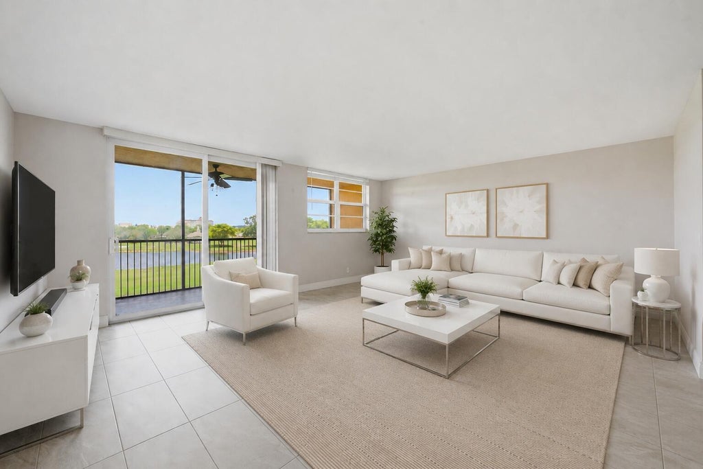 Photo of 3100 W Rolling Hills Circle #405, Davie, FL 33328 (MLS # B26030400)
