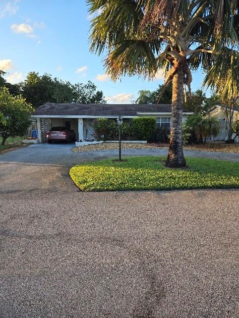 Photo of 311 NE 42nd Street, Oakland Park, FL 33334 (MLS # B26036160)