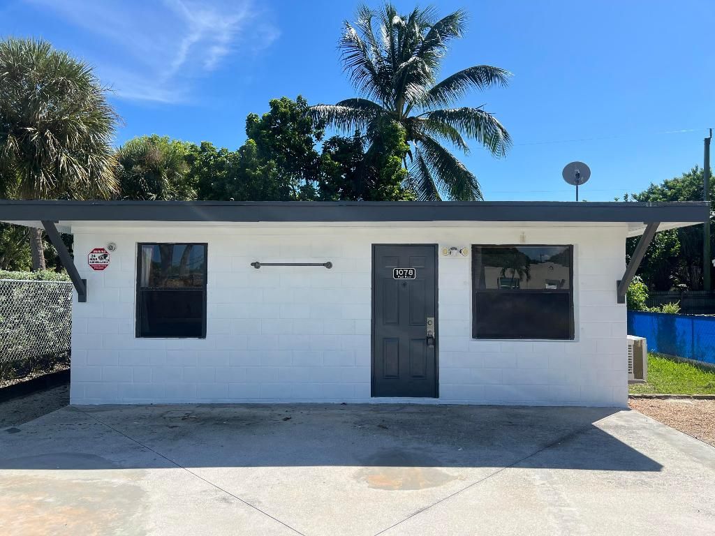 Photo of 1078 Peak Road, Lake Worth, FL 33462 (MLS # R11154626)