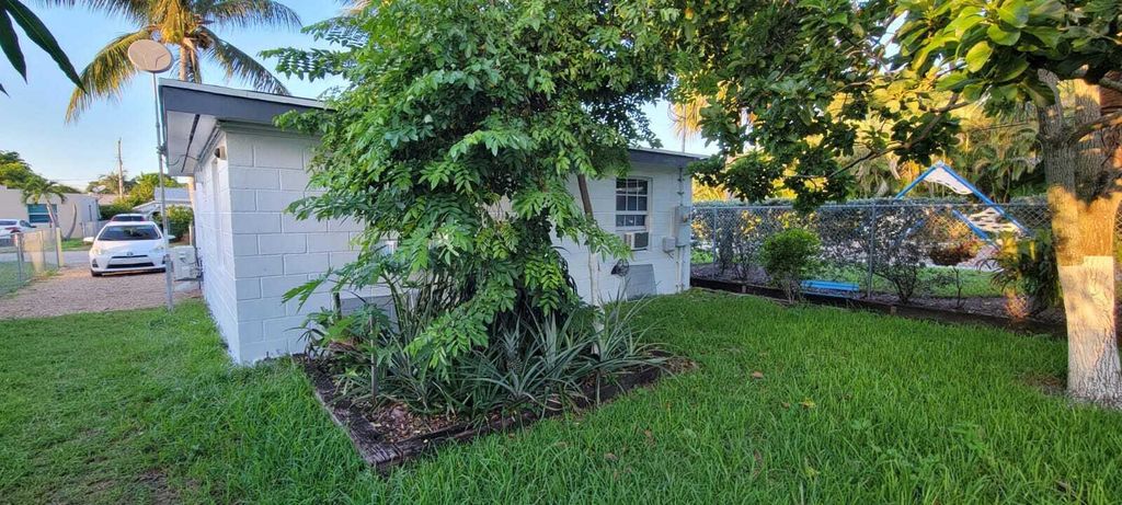 Photo of 1078 Peak Road, Lake Worth, FL 33462 (MLS # R11154626)