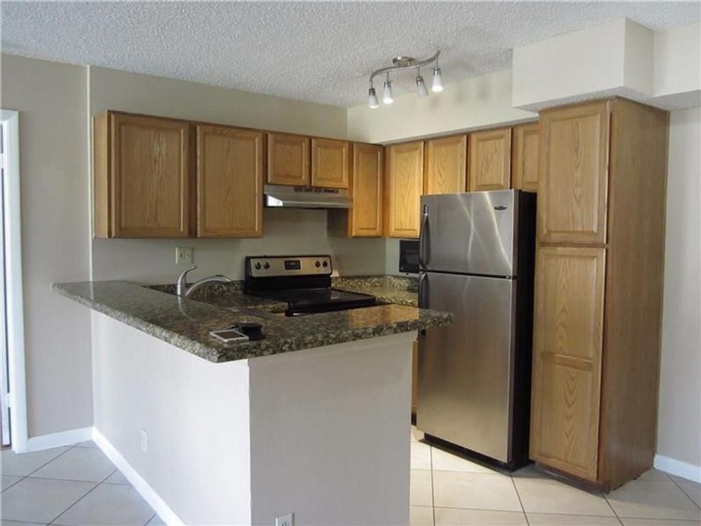 Photo of 751 Lyons Road #18102, Coconut Creek, FL 33063 (MLS # F10546087)