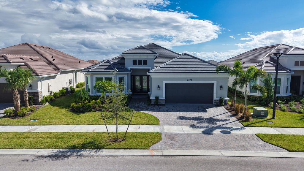 Photo of 9973 SW DAVANTI Drive, Port Saint Lucie, FL 34987 (MLS # B26089629)