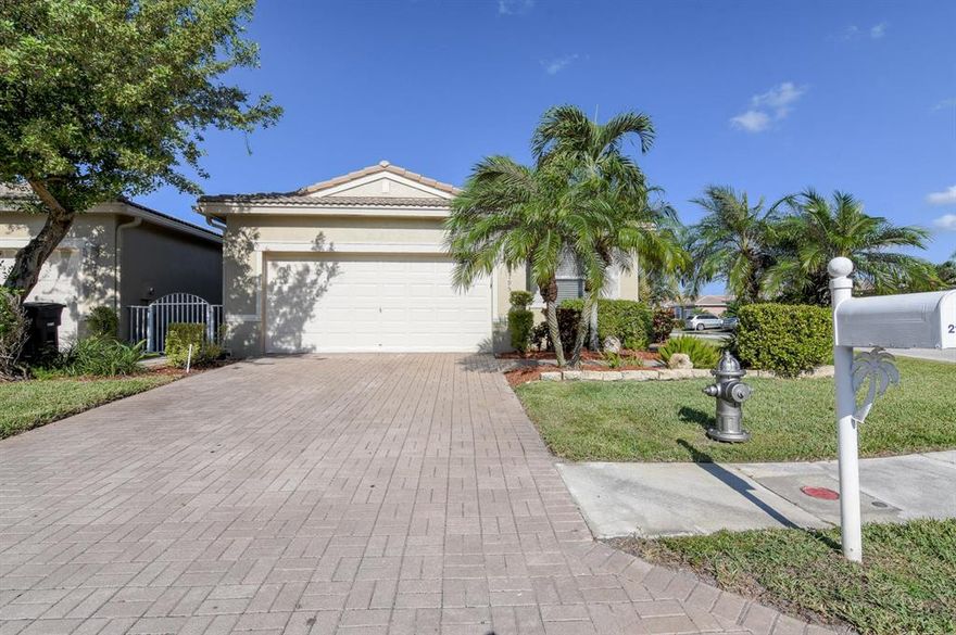 Immaculate 3/2/2 Villa, corner lot, facing the park, in ultra convenient Andros Isle.  Well maintained.  All hard floors (Ceramic tile and premium laminate).  New stainless kitchen appliances.  Wood kitchen cabinets, tiled backsplash.  Lots of closet space.  Covered and screened back patio.  Pets welcome.  No age restrictions.  HOA Fee includes award winning clubhouse and pool, 24/7 staffed gate, home security system, roof pressure cleaning, exterior painting, all outside landscaping and irrigation, basic cable, broadband, WiFi.  Private road to Publix.  easy access to Turnpike, Airport, Wellington and downtown WPB.  These locations facing the beautiful park  are not often available. Please be aware that there is no back view from back patio except privacy hedge.