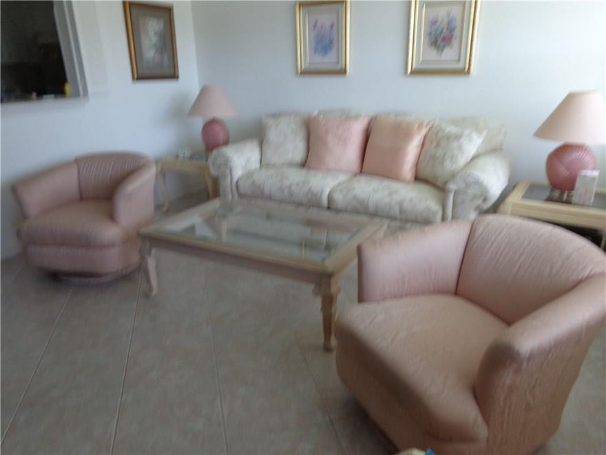 "POOL VIEW" TILE THROUGHOUT-NEWER BATHROOM, VANITY & MIRROR- NICE APPLIANCES. ENCLOSED FLORIDA ROOM OVERLOOKING GREENERY. ASSOCIATION CLAIMS 55+ COMMUNITY