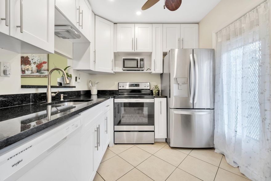 Find peace and serenity in your NEW 1ST FLOOR FURNISHED HOME located in the meticulously maintained community of Lotus Gardens. Enjoy this large 2/2 condo with a generously sized enclosed porch where you can relax while taking in views of the lake, fountains, flowers, egrets, ducks and all that nature has to offer. Your kitchen features white cabinetry, granite counters & newer SS appliances. Take comfort knowing that you have Impact windows, newer AC & tankless WH and building has already had the 50 year inspection! THIS 55+ community with all inclusive amenities Lotus Gardens boasts, like a heated pool, clubhouse w/kitchen, fitness center, billiard room, library, BBQ areas, shuffleboard and pétanque, in addition to multiple organized activities to satisfy all interests.