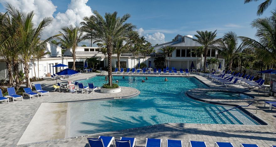 Beautiful first-floor corner unit in the resort-style community of Ocean Village. This inviting condo features a desirable split-floor plan, offering privacy and comfort for residents and guests alike. Enjoy tranquil pond views from your living space and relax on your private patio overlooking the lush golf course — the perfect setting for morning coffee or evening unwinding. 
Experience the laid-back coastal lifestyle on Hutchinson Island, where pristine beaches and ocean breezes await. And when you're ready for dining, shopping, and entertainment, take a short drive to vibrant downtown Fort Pierce and indulge in a variety of cuisine and local charm.