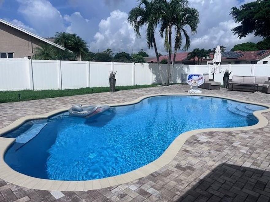 WONDERFUL WOODMONT 3 BEDROOM 2 BATH HOME WITH NO HOME OWNERS ASSOCIATION. CLOSE TO HOSPITAL,SCHOOL,SHOPPING AND RESTAURANTS. HUGE FENCED CORNER LOT WITH FANTASTIC NEWLY DIAMOND BRIGHTED POOL,LARGE COVERED PATIO,OUTDOOR LIVING AT ITS BEST WITH A LARGE DINING AND BBQ AREA. LOTS OF PLAY AREA WITH PRIVACY. SPACIOUS YARD PROVIDES LOTS OF RUNNING SPACE FOR YOUR PETS. BIG CIRCULAR STAMPED CONCRETE DRIVEWAY. NEW A/C UNIT,FRESHLY PAINTED INSIDE AND OUT. BEAUTIFUL WOOD LAMINATE FLOORING,UPDATED SECOND BATHROOM,10x12 SHED IN THE YARD REMAINS. 80 PERCENT HURRICANE WINDOWS ALREADY INSTALLED. MAKE THIS MOVE IN READY HOME YOURS.