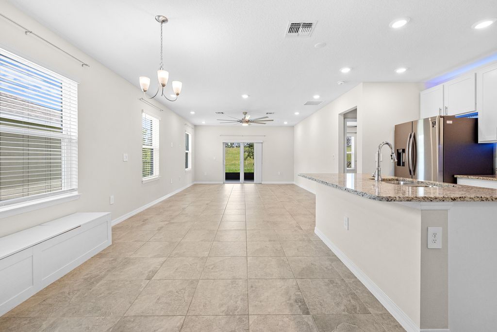 Photo of 10972 SW Vasari Way, Port Saint Lucie, FL 34987 (MLS # B26046238)