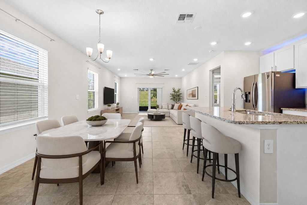 Photo of 10972 SW Vasari Way, Port Saint Lucie, FL 34987 (MLS # B26046238)