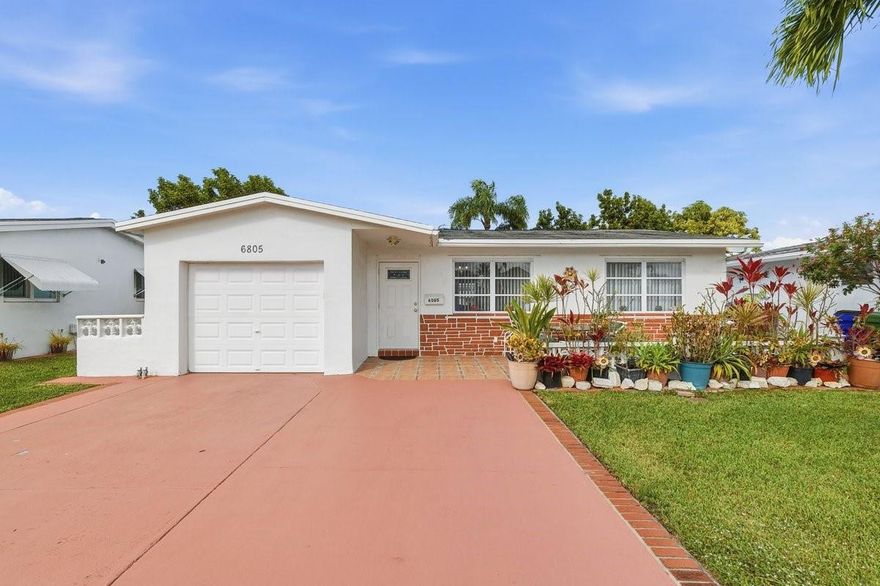 This property is located in the over 55 Community  of Paradise Garden II, this home features includes a NEW ROOF  April 2026, spacious Florida room and 2 spacious bedrooms and one full bathroom and a 1/2 bathroom. Updated kitchen. Pets are allowed. The community offers a clubhouse, with heated pool and a game room and many other amenities. This property also has indoor laundry room  with washer and dryer,  There is also a single car garage and ample parking space in the driveway. The property is located to nearby shopping areas and a Mall and easy access to major Highways. HOA requires a 700 credit score for Buyer. The maintenance fee is $89 monthly, and covers mowing of the lawn and painting of the house every 5 years.   Seller is very motivated relocation shortly.
