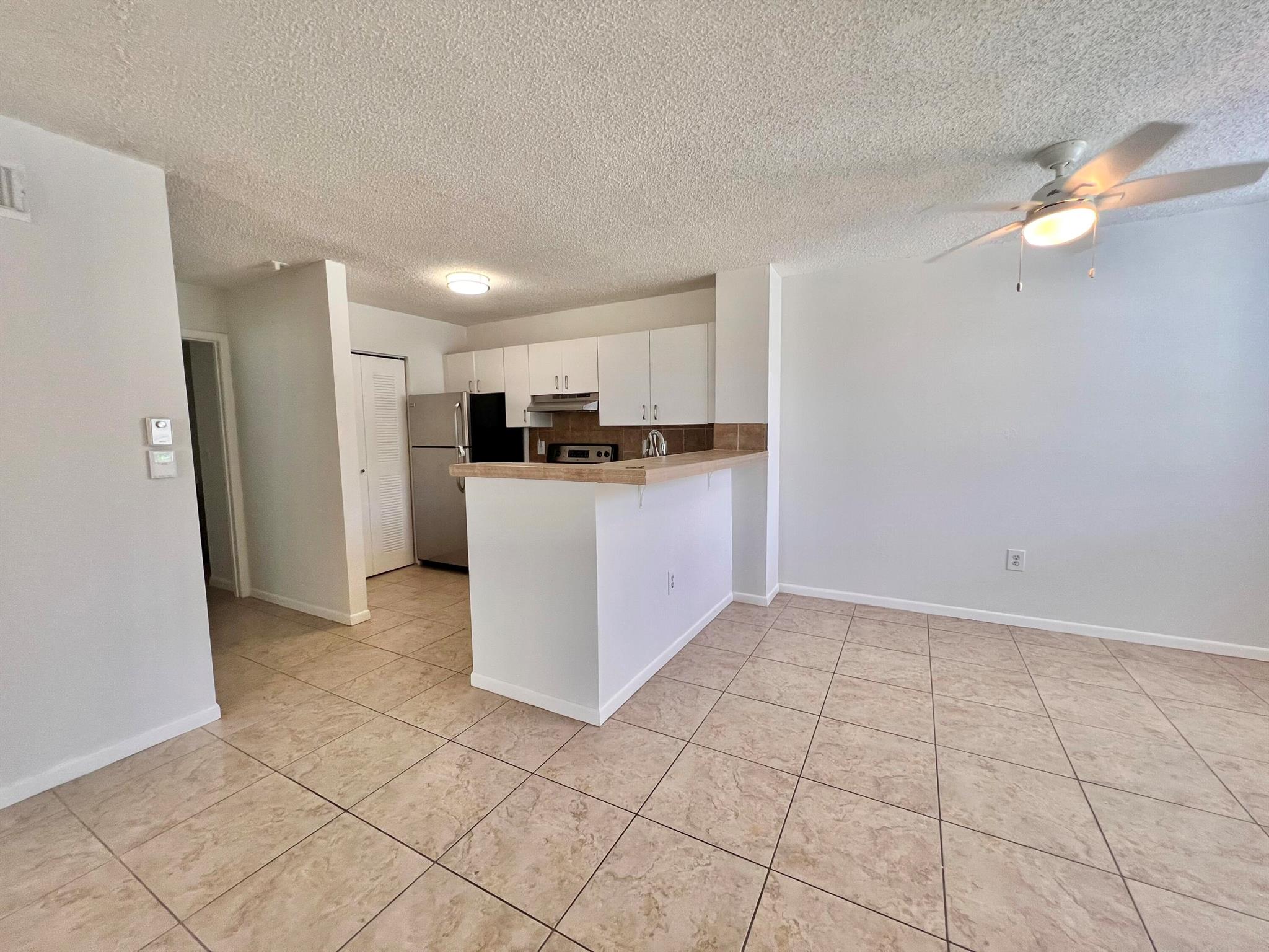 FOR RENT- 1 bedroom 1 bathroom First Floor Condo. Tile countertops. Stainless Steel appliances. Freshly painted. Open floor plan. Tile throughout. Washer and dryer in unit. Very quiet gated/style Resort community with great amenities ,just as pool, hot tub, gym, racquetball, tennis, clubhouse and onsite manager. Just minutes from shopping, dining, banking. Pet friendly. Easy access to I-95 Milano Condominium. Water included in the rent !