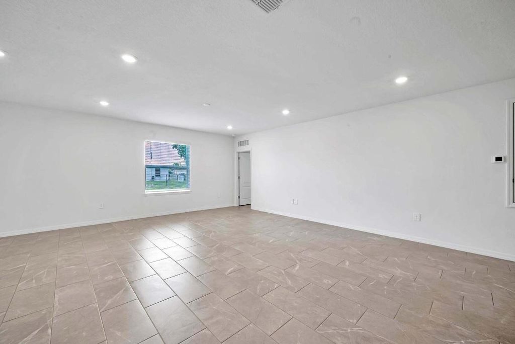 Photo of 6459 NW Frenze Street, Port Saint Lucie, FL 34986 (MLS # R10938490)