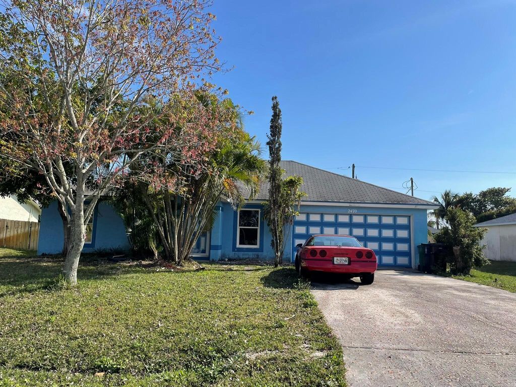 Photo of 2470 SE Toledo Avenue, Port Saint Lucie, FL 34952 (MLS # R11059512)