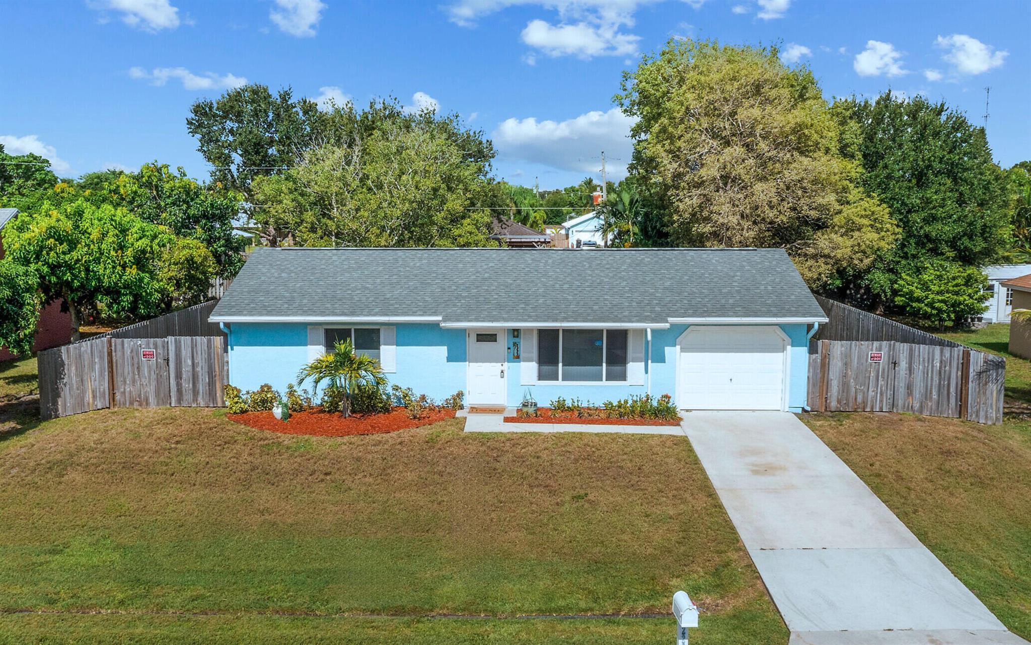 NEW ROOF INSTALLED AUGUST 6TH, 2025!! Step into this beautifully remodeled 2-bedroom gem featuring NEW IMPACT windows and doors, a 2021 A/C, 2025 roof, 2021 instant water heater, 2021 privacy fence, and 2023 stainless steel kitchen appliances! The kitchen stuns with quartz countertops, a modern sink, and a gorgeous tile backsplash. The renovated bathroom includes a sleek new vanity and stylish shower tile.You'll love the spacious walk-in closets, ALL new window treatments, upgraded lighting throughout, a 6x8 storage shed, and even a generator hook-up for added peace of mind. Located just minutes from shopping, dining, and the hospital -- and only 15 minutes to the beach! This home checks ALL the boxes. Don't miss out!