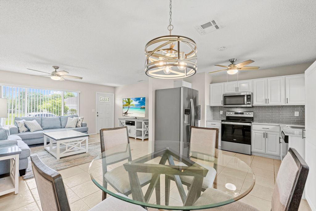 Photo of 2222 SE Maize Street, Port Saint Lucie, FL 34952 (MLS # R11105157)