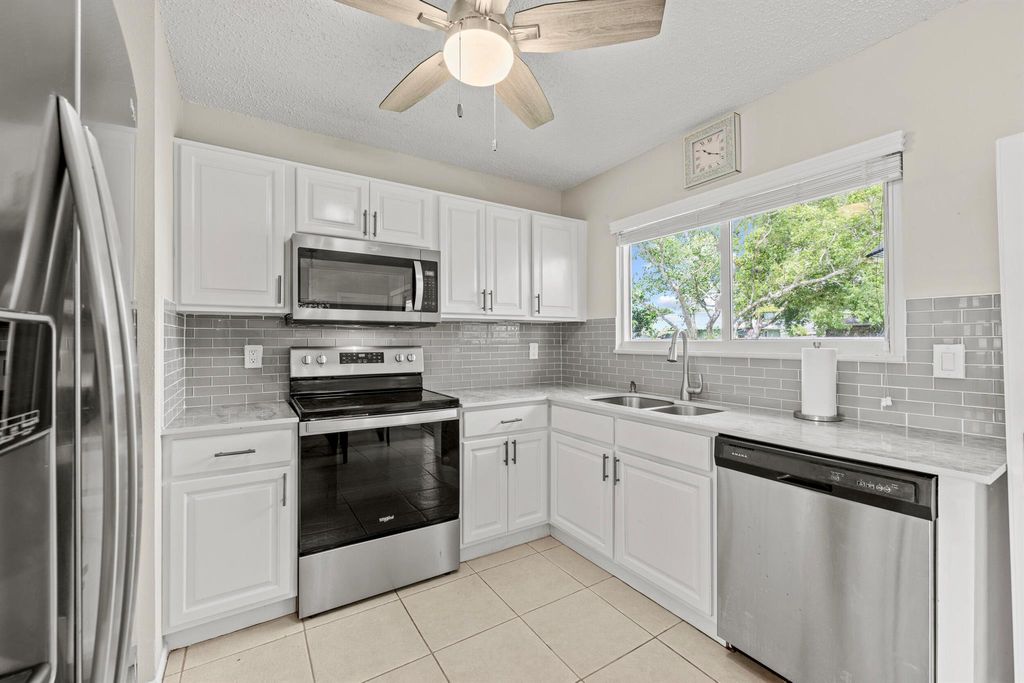 Photo of 2222 SE Maize Street, Port Saint Lucie, FL 34952 (MLS # R11105157)