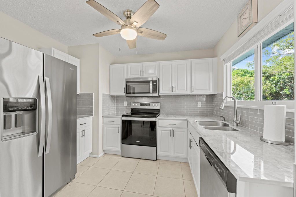 Photo of 2222 SE Maize Street, Port Saint Lucie, FL 34952 (MLS # R11105157)