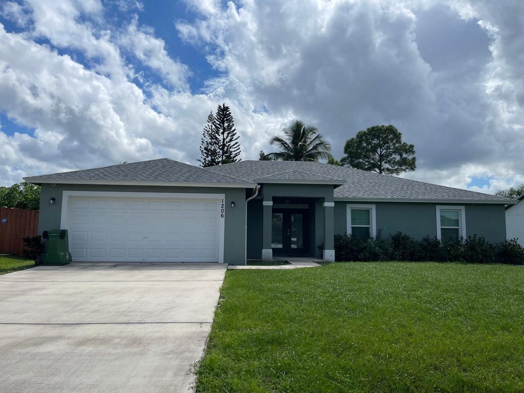 Photo of 1206 SW Asturia Avenue, Port Saint Lucie, FL 34953 (MLS # R11023646)