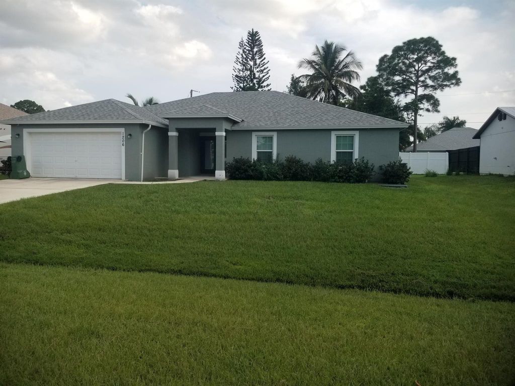Photo of 1206 SW Asturia Avenue, Port Saint Lucie, FL 34953 (MLS # R11023646)