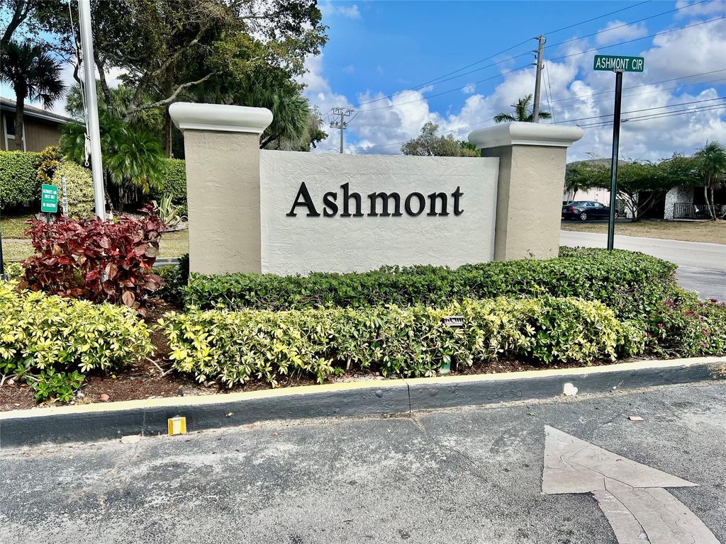 Photo of 7426 Ashmont Circle #211, Tamarac, FL 33321 (MLS # F10552396)