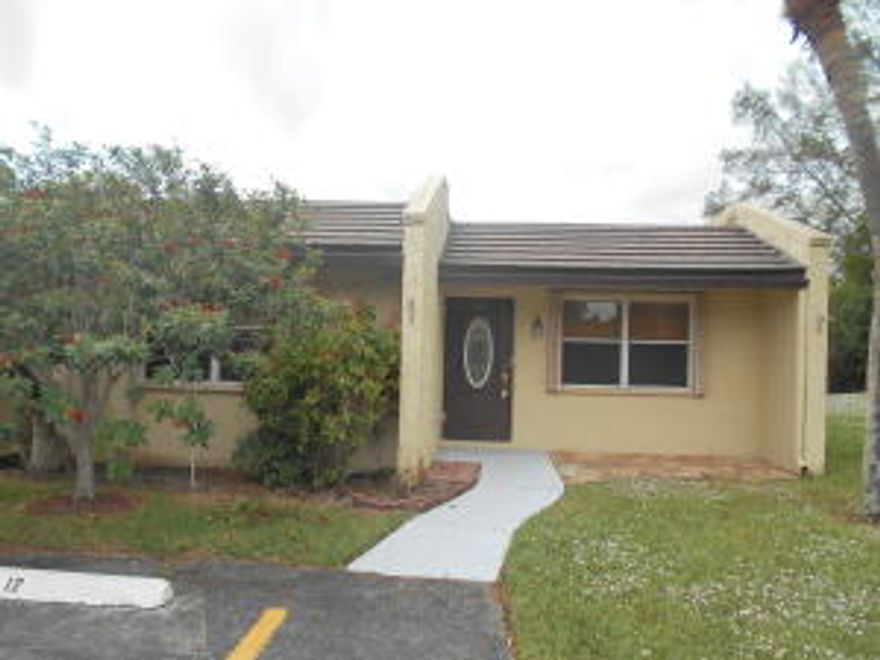 UPDATED END VILLA, WITH LOVELY, SERENE WATER VIEW ! TWO LARGE BEDROOMS & BATHS BOTH HAVE WALK IN SHOWERS !FORMAL DINING ROOM ,SPACIOUS EAT IN KITCHEN, WOOD CABINETS, ,NEW STAINLESS STEEL APPLIANCES,NEW TILED FLS W/WOOD LAMINATE IN 2ND BDRM. NEW A/C & WATER HTR, NEW WASHER & DRYER. ALL NEWLY PAINTED. SECURITY SYSTEM. ACCORDION SHUTTERS ON ALL WINDOWS, W/ CLEAR PANELS FOR SLIDING DOOR ON PATIO. SCREENED PATIO WITH STORAGE CLOSET ALL TILED & FANTASTIC VIEW ! JUST A QUICK WALK TO LK CONSTANCE SATELLITE POOL. MANY AMENITIES !  24/7 GUARD GATED COMMUNITY WITH TWO CLUBHSES, HEATED POOLS & SPA HOT TUBS, GYMS, CAFES FOR BREAKFAST & LUNCH. TWO SOCIAL DIRECTORS TO KEEP YOU BUSY & HAVING FUN! LOCATED CLOSE TO SHOPPING, RESTAURANTS & TURNPIKE ! AIRPORT & OCEAN A SHORT DRIVE AWAY ALSO ! PARADISE AWAITS