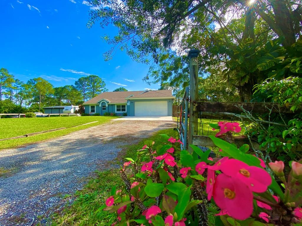 Photo of 15212 76th Road N, Loxahatchee, FL 33470 (MLS # R10759865)