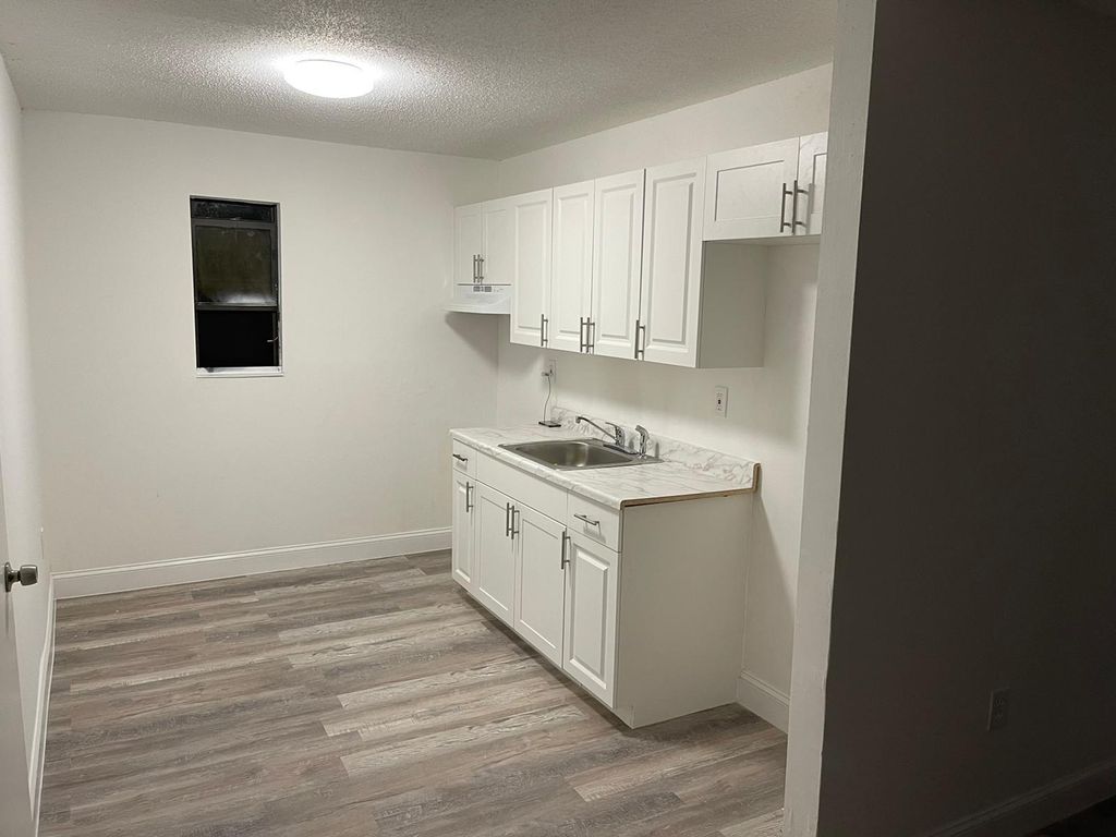 Photo of 2590 NW 14th St #A, Fort Lauderdale, FL 33311 (MLS # F10487020)