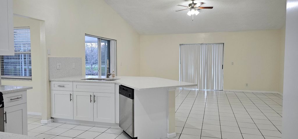 Photo of 1488 Fairway Circle, Greenacres, FL 33413 (MLS # B26013063)