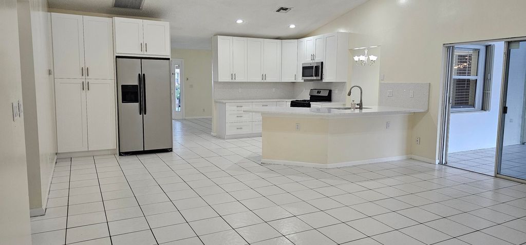 Photo of 1488 Fairway Circle, Greenacres, FL 33413 (MLS # B26013063)