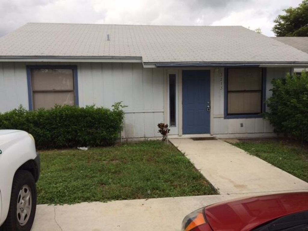 Photo of 3213 Foxridge Court, Palm Springs, FL 33461 (MLS # R10986389)