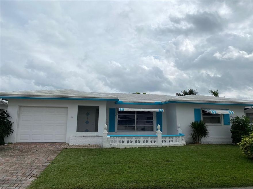 This spacious single family home is ready for it's new owners and their personal touches.  Great bones and layout! Large living room & separate dining area with sliders out to the large bright and sunny windowed Florida room.  An Eat-in kitchen also with sliders out to the Florida room.  Primary BR has a large walk-in closet and sliders out the Florida room,  the primary bath has a walk-in shower. 2nd BR has wide wall closet.  Full laundry room & a one car garage complete this home.  This is a 55+ community, with clubhouse & large pool.