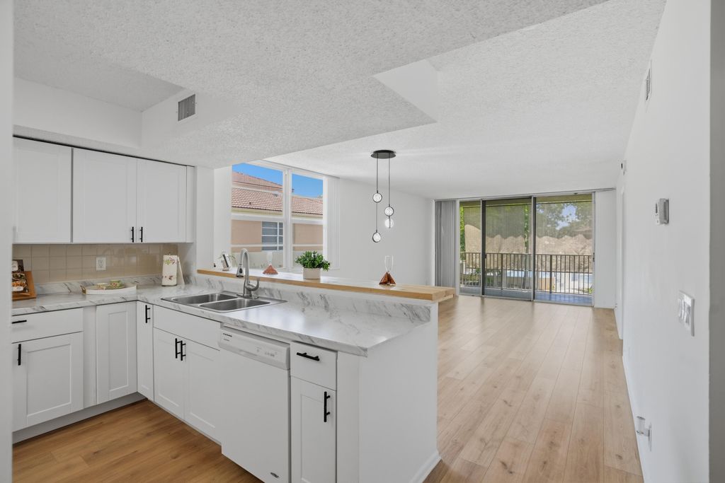 Photo of 8296 NW 24th Street #8296, Coral Springs, FL 33065 (MLS # B26040829)