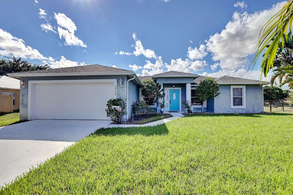 Photo of 2450 SW Monterrey Lane SW, Port Saint Lucie, FL 34953 (MLS # R10756659)