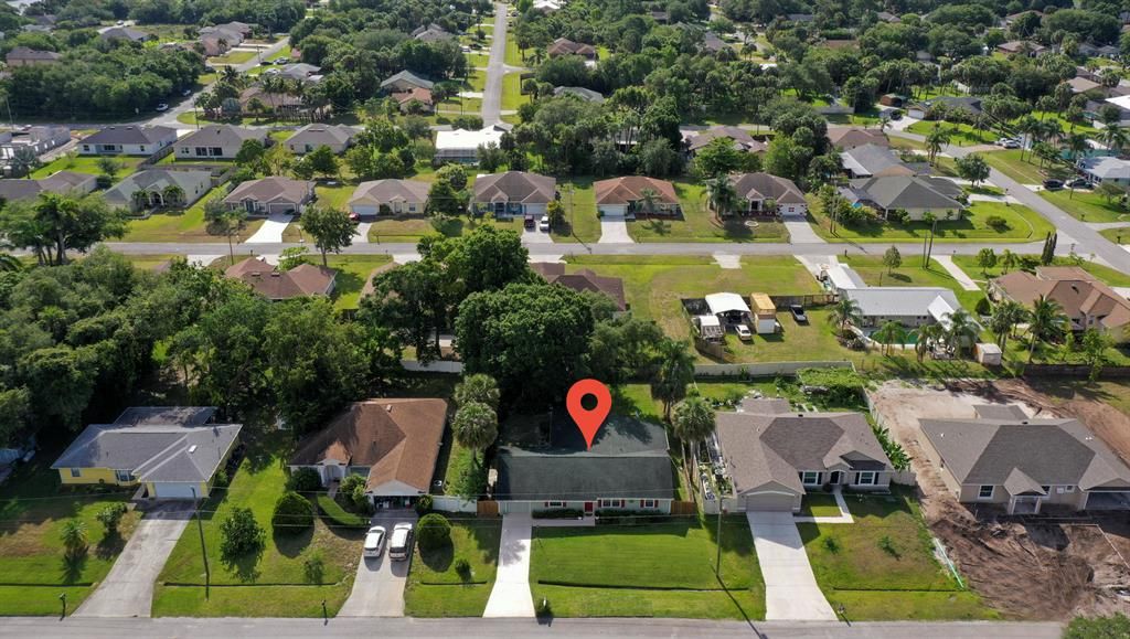 Photo of 2465 SW Washington Street, Port Saint Lucie, FL 34953 (MLS # R10714848)