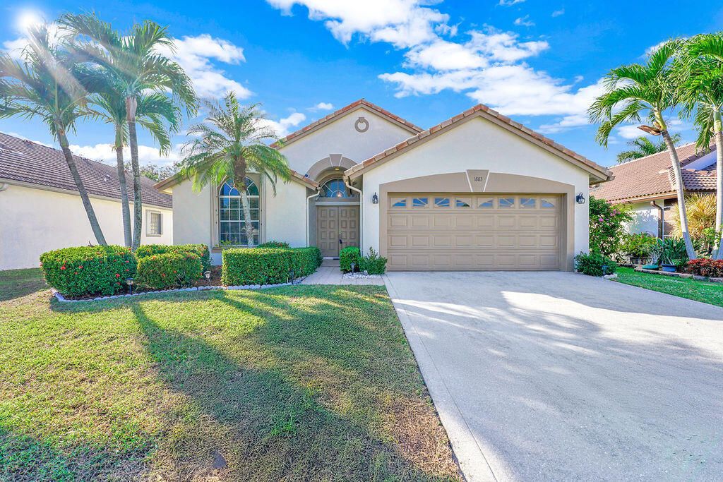 Photo of 1883 Oak Berry Circle, Wellington, FL 33414 (MLS # B26006074)