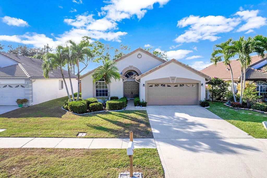 Photo of 1883 Oak Berry Circle, Wellington, FL 33414 (MLS # B26006074)