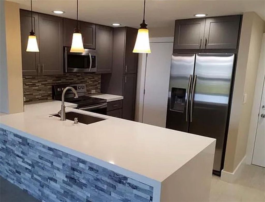 Photo of 900 NE 12th Ave #703, Hallandale Beach, FL 33009 (MLS # F10370612)