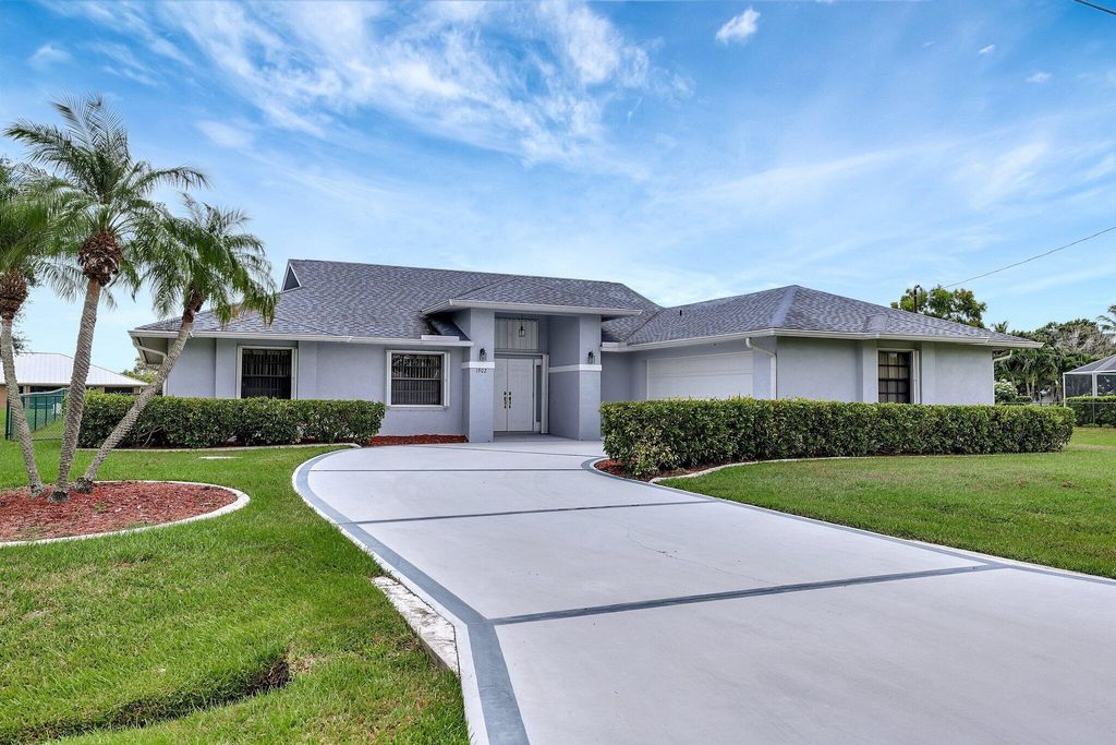 Photo of 1902 SE Gaskins Circle, Port Saint Lucie, FL 34952 (MLS # R11014106)