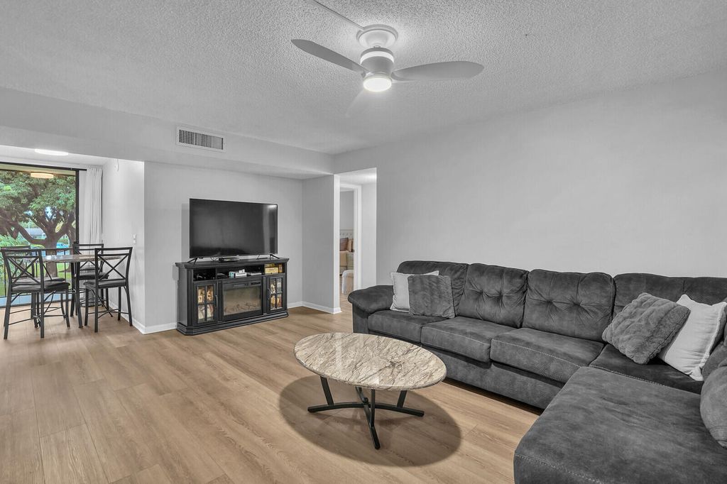 Photo of 5190 Las Verdes Circle #214, Delray Beach, FL 33484 (MLS # R11131881)