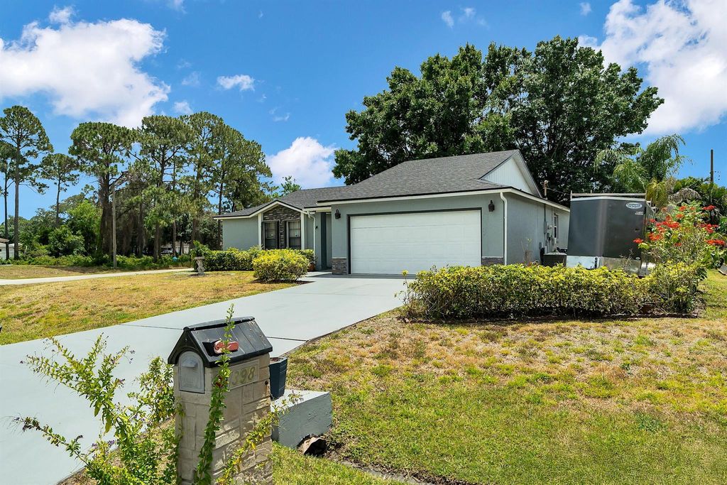 Photo of 398 SE Husted Terrace, Port Saint Lucie, FL 34983 (MLS # R11088908)