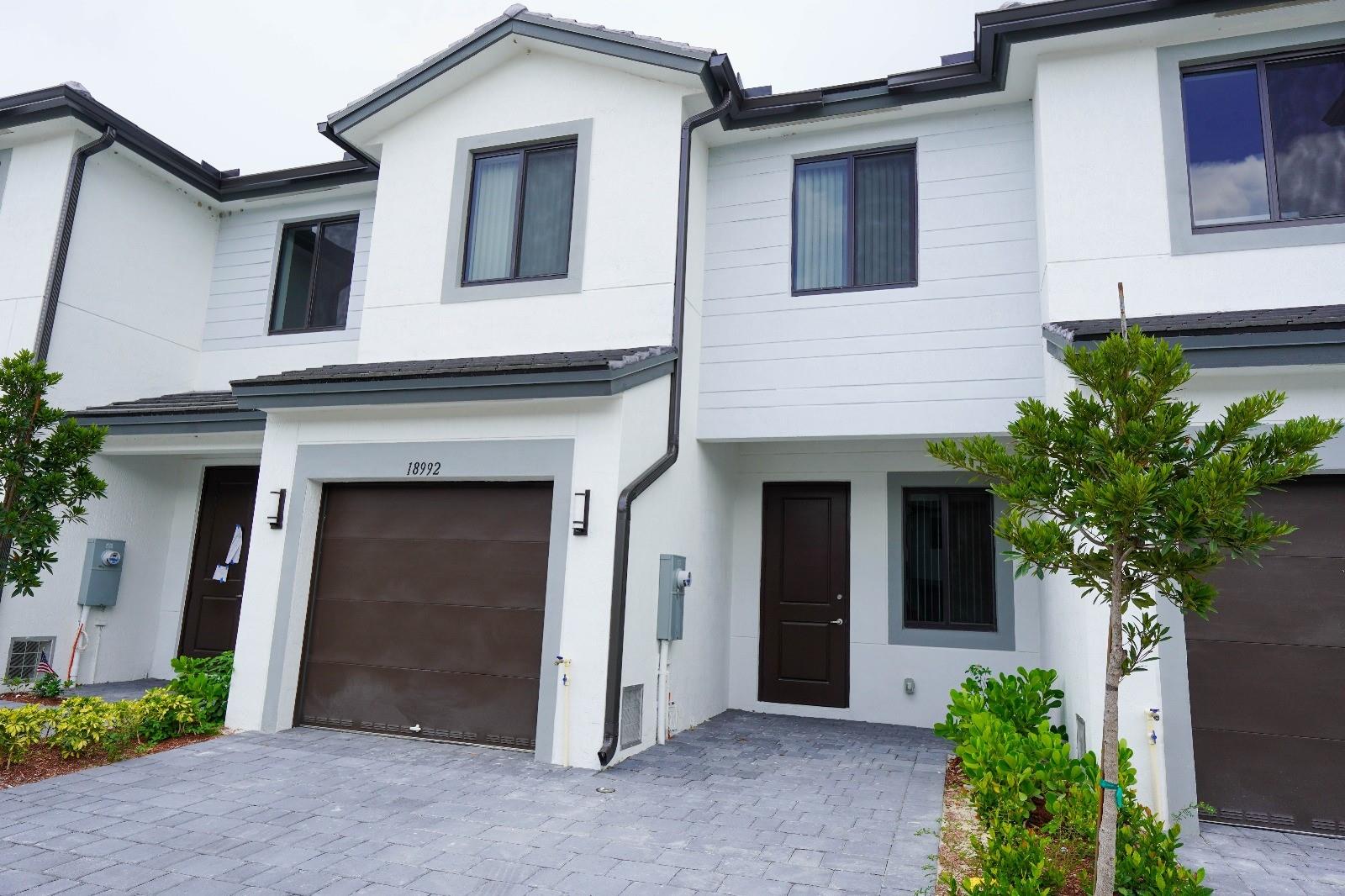 Located in the newly developed Century Park Square community, this modern 2-story townhouse offers 3 bedrooms and 2.5 bathrooms with modern finishes and plenty of natural light. The home features tile flooring throughout, vinyl on the second floor, an open kitchen designed for both everyday living and entertaining, a one-car garage, and a fully fenced backyard for added privacy and relaxation. Just minutes from local shops, dining, and the beloved Robert Is Here fruit stand.